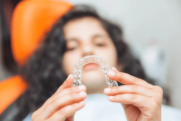 invisalign teen vs adult features