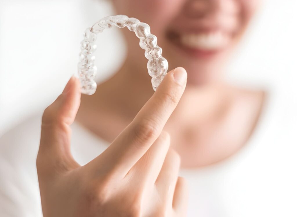 what are invisalign buttons